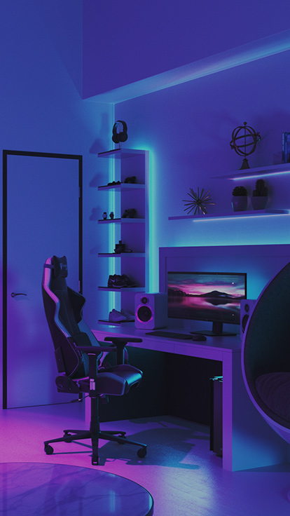 This is an image of Nanoleaf Essentials Lightstrips in a desk set up. The color-changing RGB lightstrips provide a nice back light and glow that makes it perfect for gaming and setting the ideal vibe in the room.