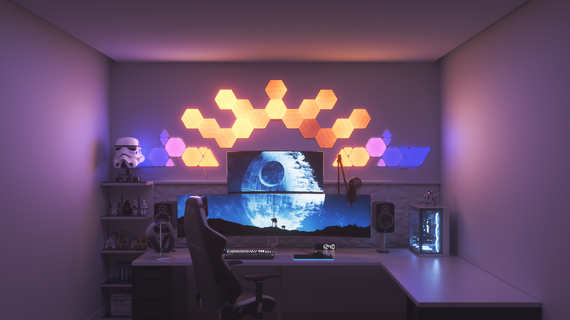 Espace de jeu au style futuriste avec les panneaux lumineux à DEL aspect bois Nanoleaf Elements au-dessus du moniteur de l’ordinateur. Les meilleures lumières intelligentes pour votre maison intelligente.