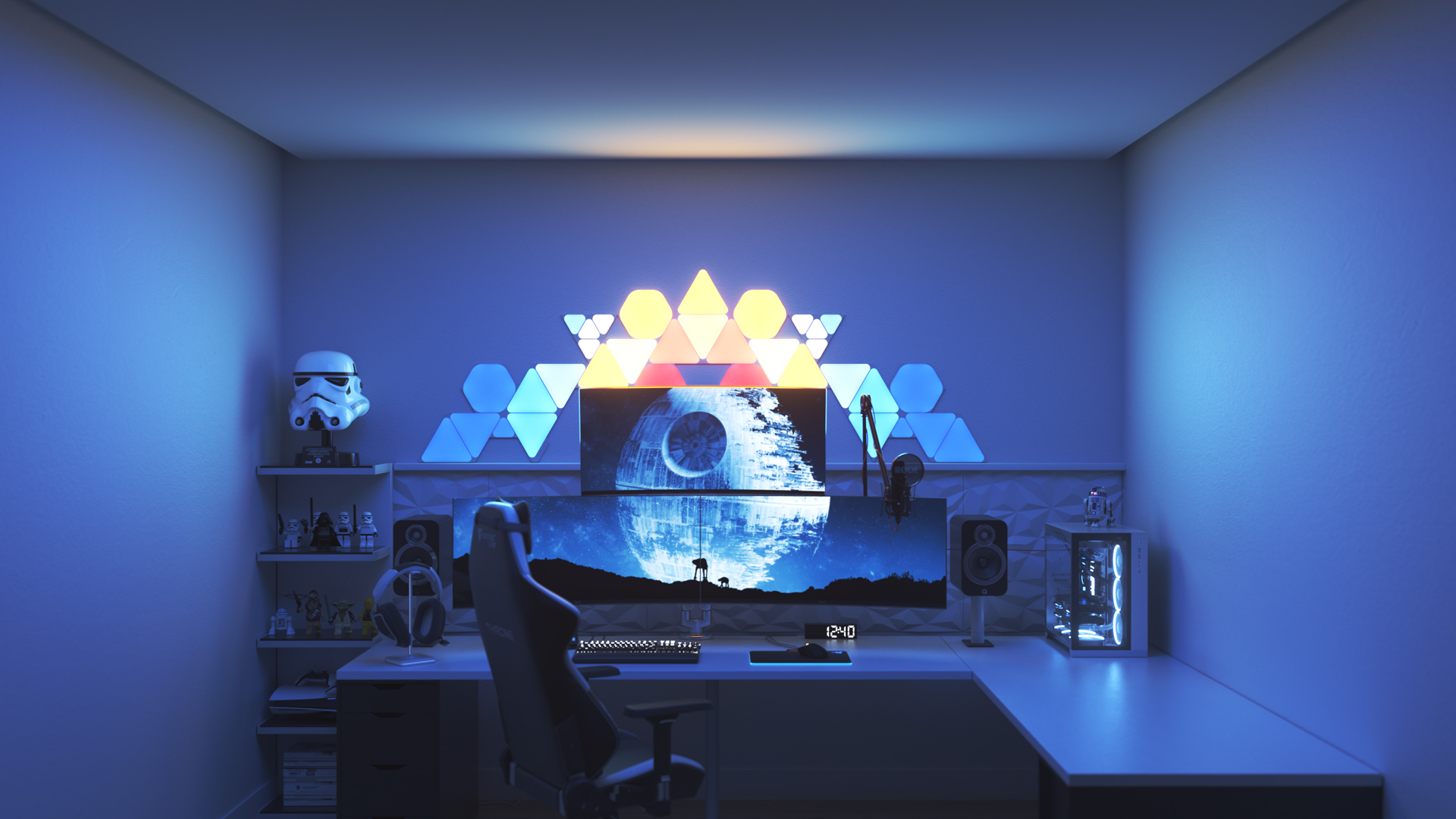 Un espace de jeu au style futuriste avec les panneaux lumineux Nanoleaf Shapes intelligents DEL au-dessus du moniteur. Les meilleurs choix de couleurs de lumières pour vos parties de jeux sur ordinateur.