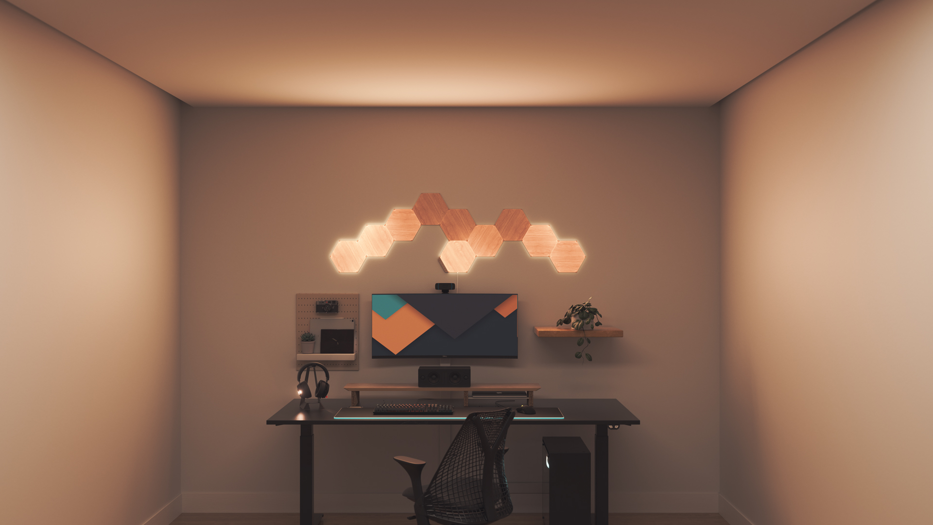 Espace de jeu au style minimaliste avec les panneaux lumineux aspect bois Nanoleaf Elements au-dessus du moniteur de l’ordinateur. Les lumières intelligentes parfaites pour votre maison intelligente.
