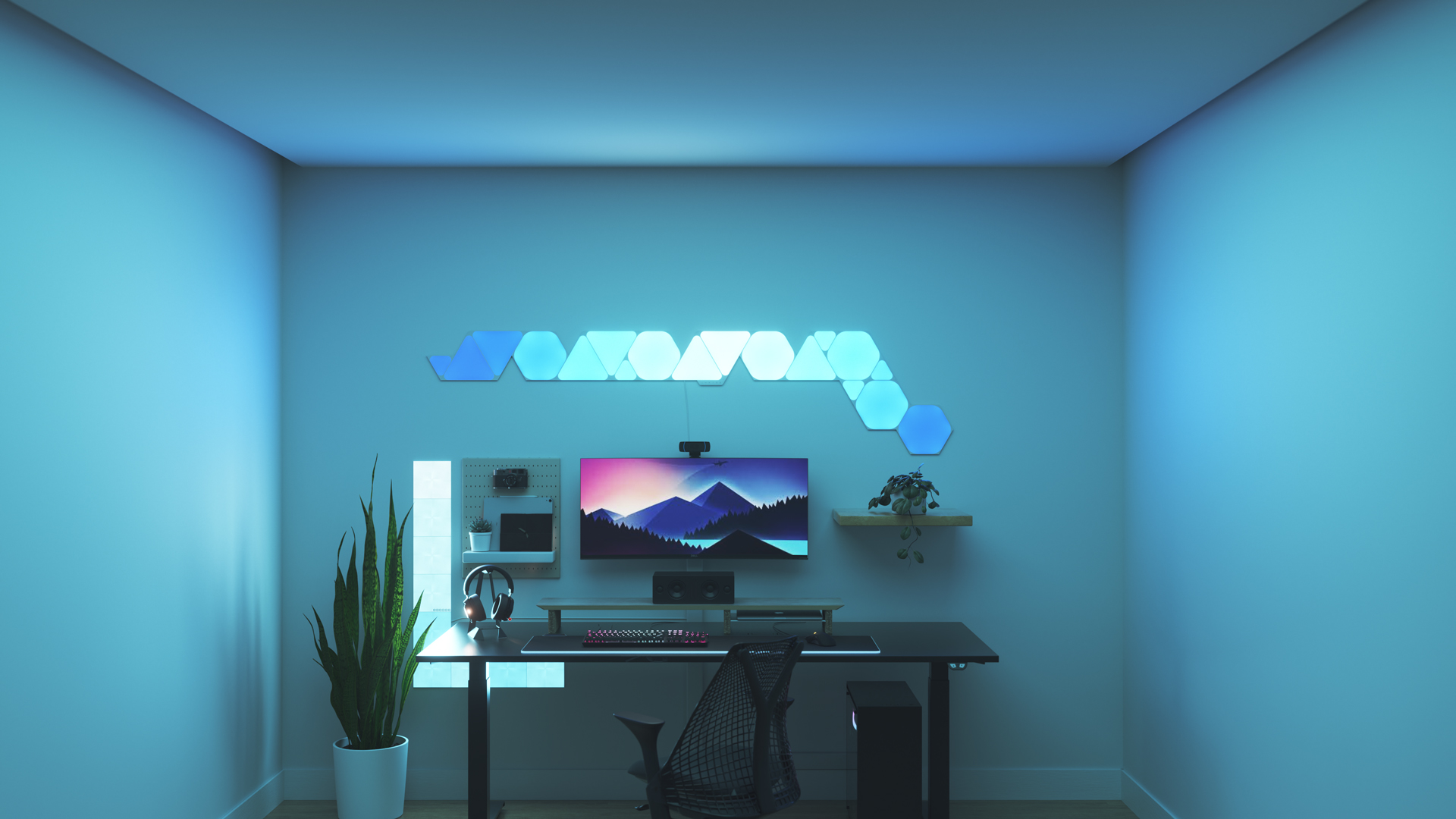 Un espace de jeu au style minimaliste avec les panneaux lumineux Nanoleaf Shapes RGB intelligents au-dessus de votre moniteur. Les jeux sur ordinateur sont meilleurs avec ces jeux de lumière.
