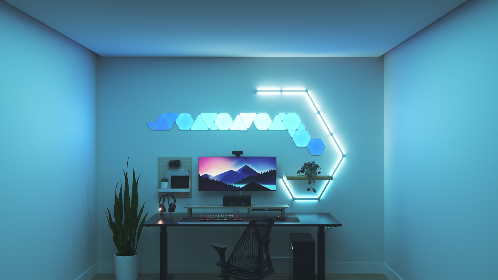 Un espace de jeu au style minimaliste avec les panneaux lumineux Nanoleaf Shapes RGB intelligents au-dessus de votre moniteur. Les jeux sur ordinateur sont meilleurs avec ces jeux de lumière.