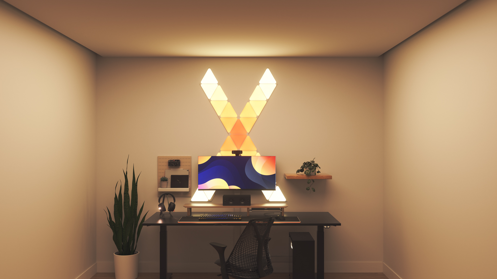 Un espace de jeu au style Kawaii avec les panneaux lumineux Nanoleaf Shapes Triangle RGB intelligents au-dessus du moniteur de l’ordinateur. Les lumières intelligentes parfaites pour compléter l’esthétique du mordu des jeux.