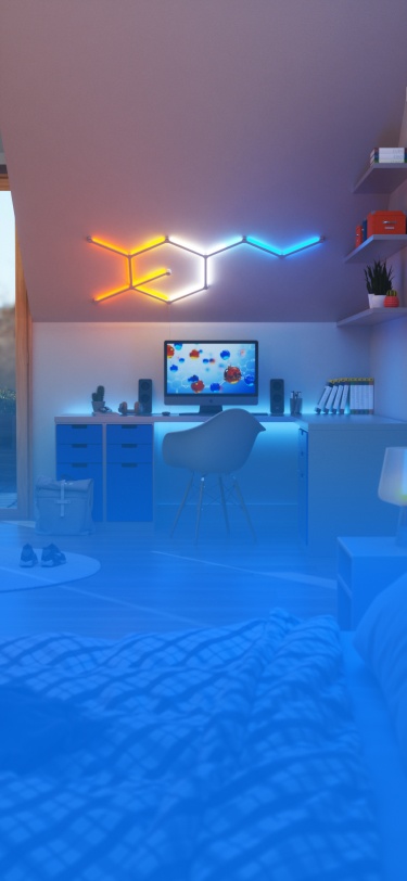 Bedroom desk setup with Nanoleaf Lines RGB lights. The modular smart light bars are mounted on an angled wall above the desk.