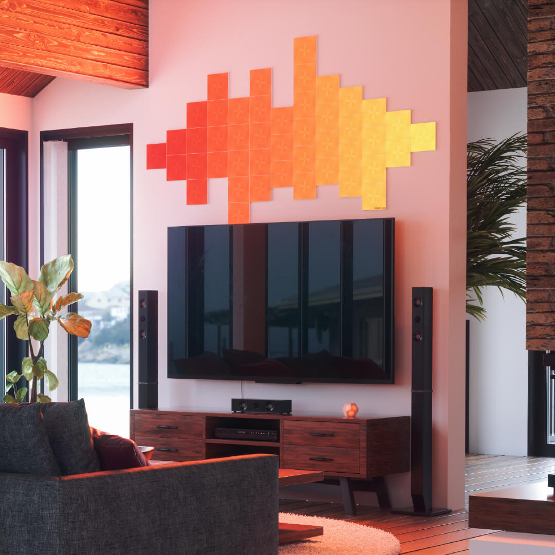 Panneaux lumineux modulaires intelligents Carrés aux couleurs changeantes Nanoleaf Canvas, montés sur un mur de salon. Produit semblable à Philips Hue, Lifx. HomeKit, Google Assistant, Amazon Alexa, IFTTT. 